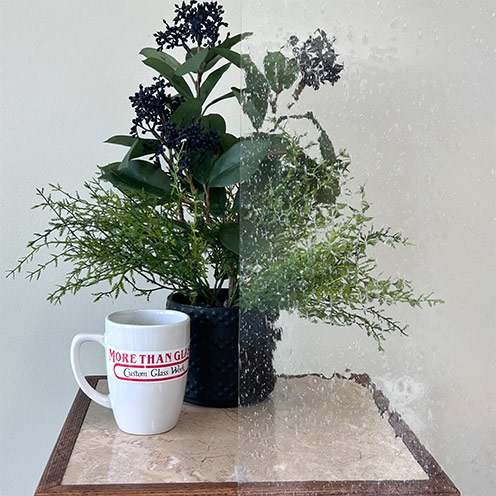 Clear Seeded Cabinet Door Glass With Bubble Texture And Partial Plant View – More Than Glass