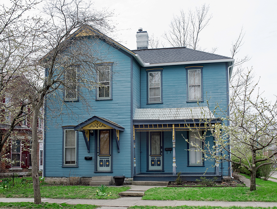 Old Blue House with Gold Trim